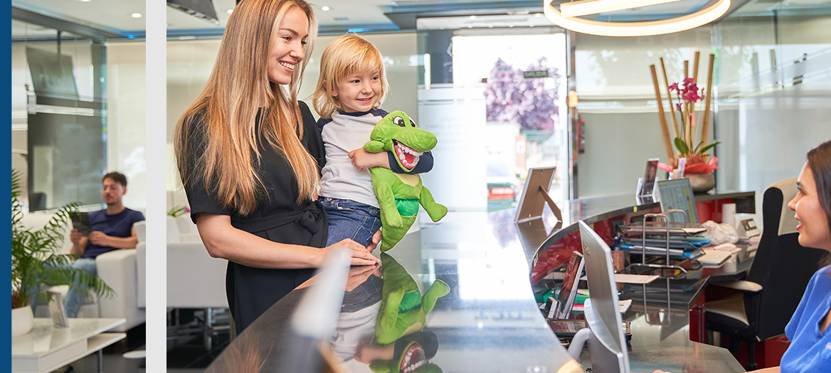 Woman with child in electrical workplace